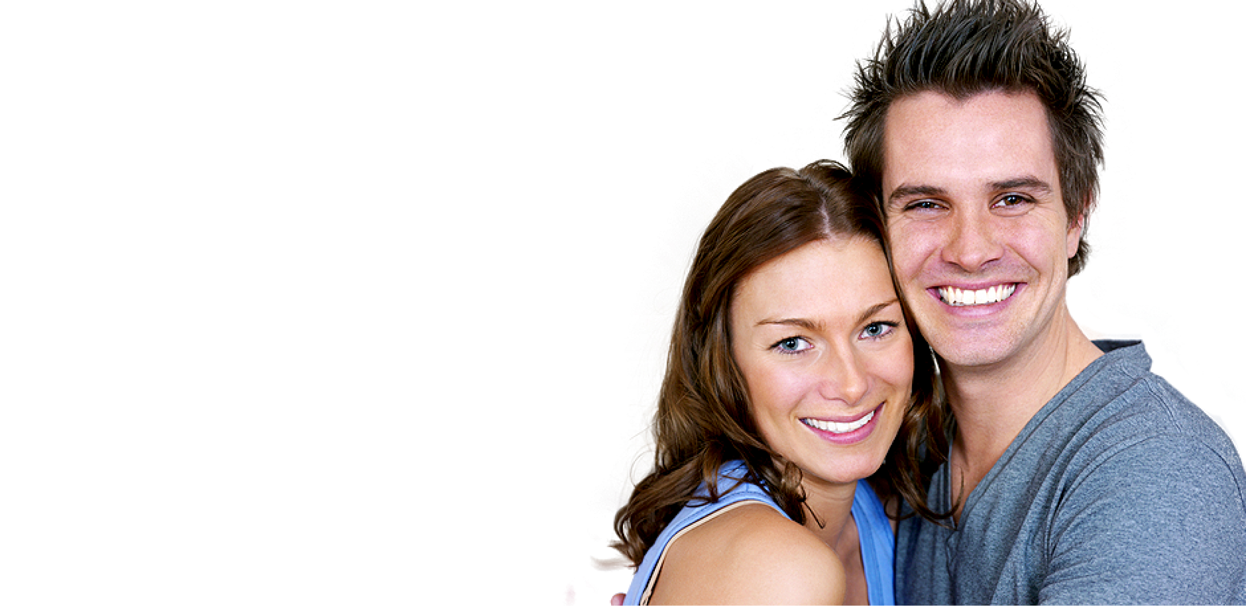 A couple smiling against white background.