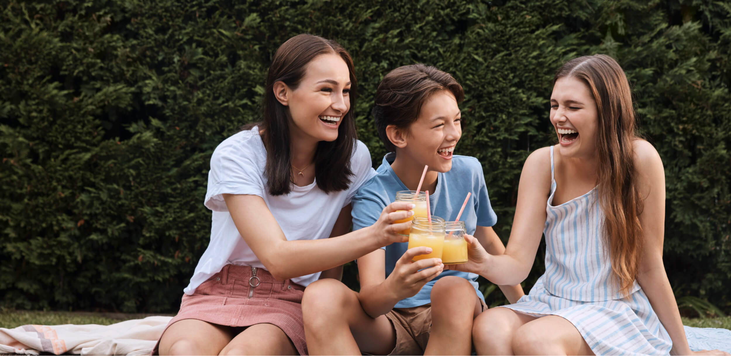 A group of people enjoying their drinks.